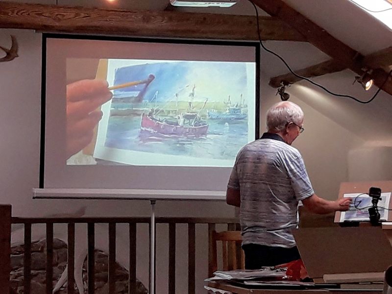 Screen and projector/ camera for close up of  tutor demos -- (this is tutor Roy simmons in action ) Quirky Workshop' at Greystoke Craft Garden Barns near Penrith, Ullswater  Lake District, Eden Valley in Cumbria 