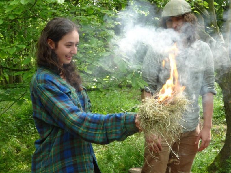 Blowing an ember into a flame