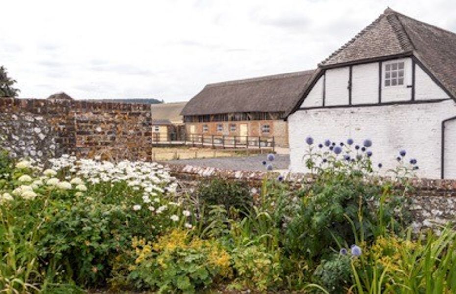 Our venue is a beautiful thatched barn on a working farm in The Meon Valley.