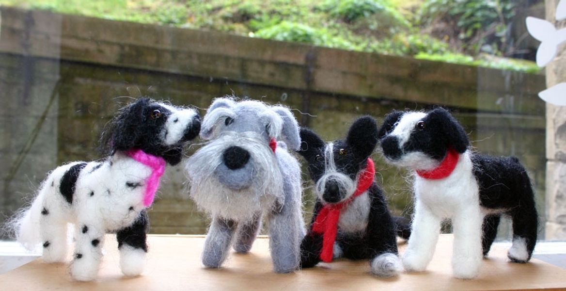 Students needle felted dogs