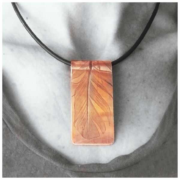 Feather embossed Pendant by Angela