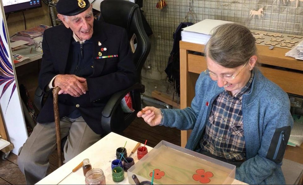 WW2 Veteran Ray admiring his daughters poppy marbling