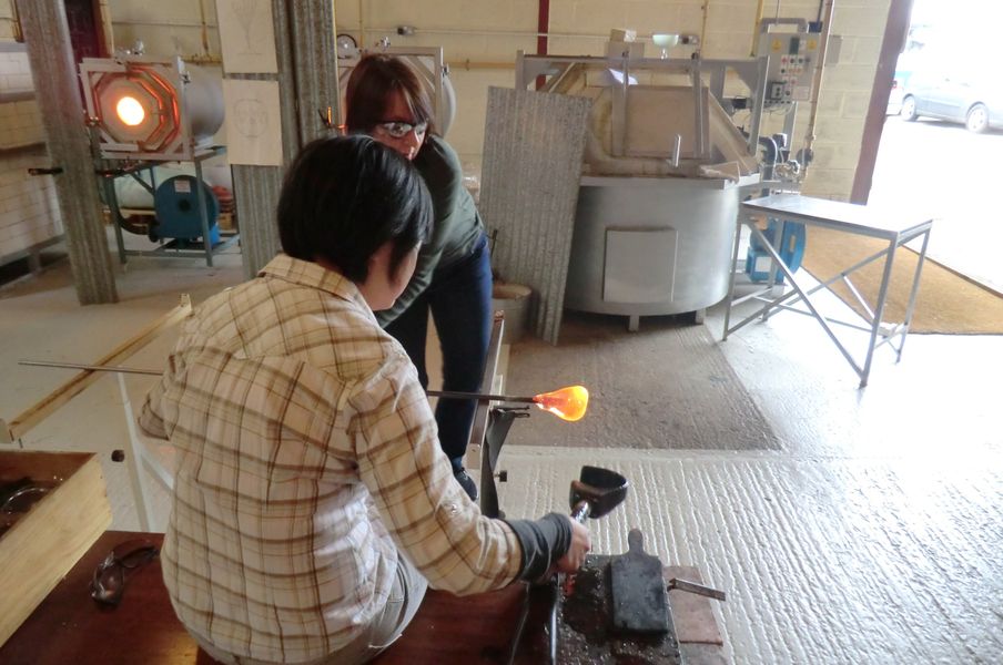 A glassmaking class under way
