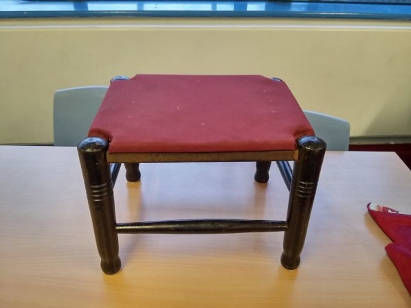 Oak footstool needing refurbishment - upholstery workshop near Salisbury