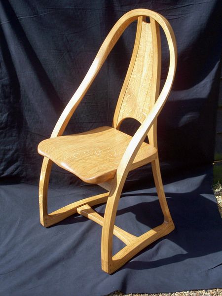 Chair in laminated and solid English Oak.Created by,Adrian Parfitt.