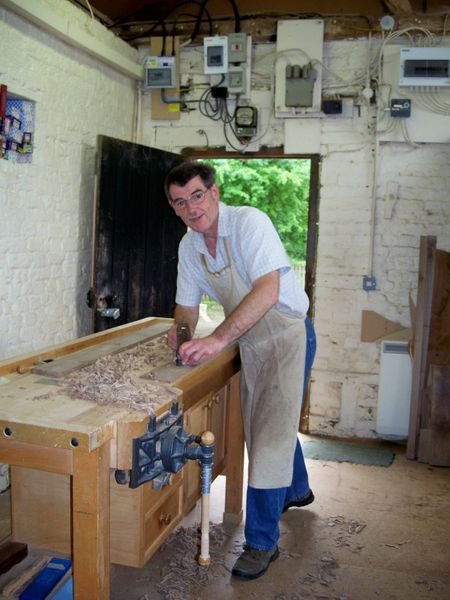Adrian at work in his old workshop.