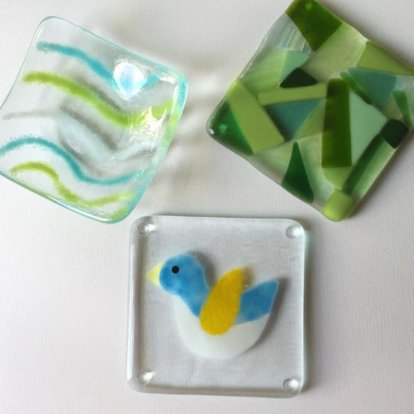 Coater and trinket designs using frit and coloured glass.
