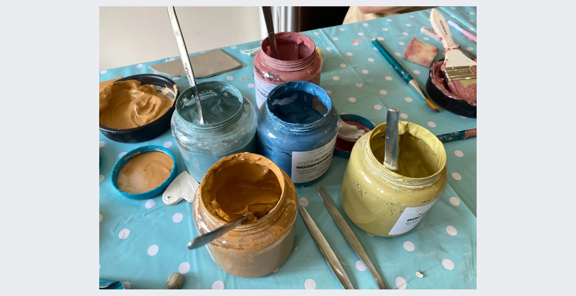 Pots of coloured decorating slips.