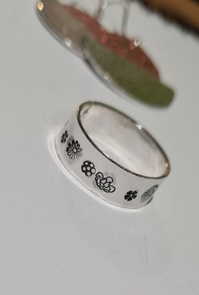 Silver ring with oxidised texturing