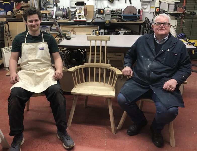 A well deserved sit down and proving the chairs work.