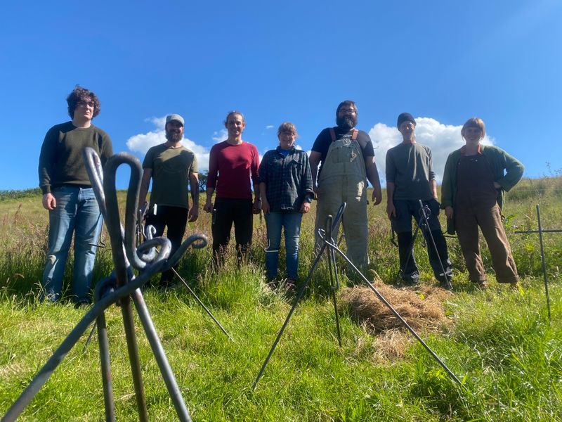 Course students with tripod in field