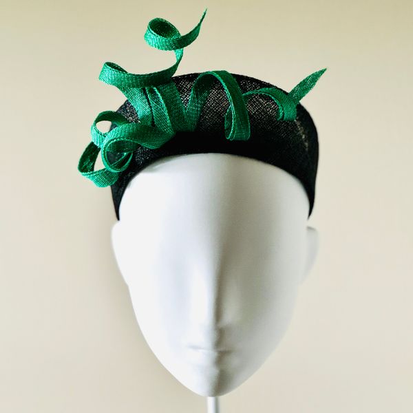 Black sinamay halo with emerald green trimmed trim (front view)