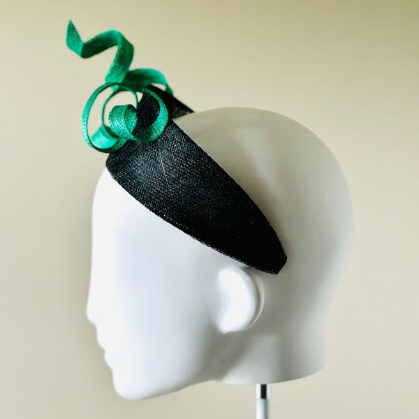 Black sinamay halo with emerald green trimmed trim (side view left)