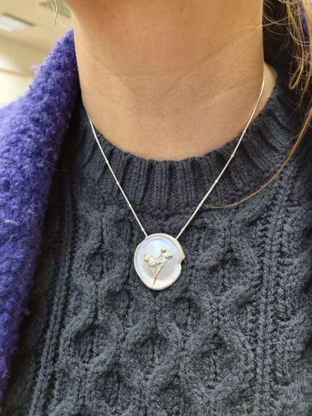 Proudly worn silver clay pendant!