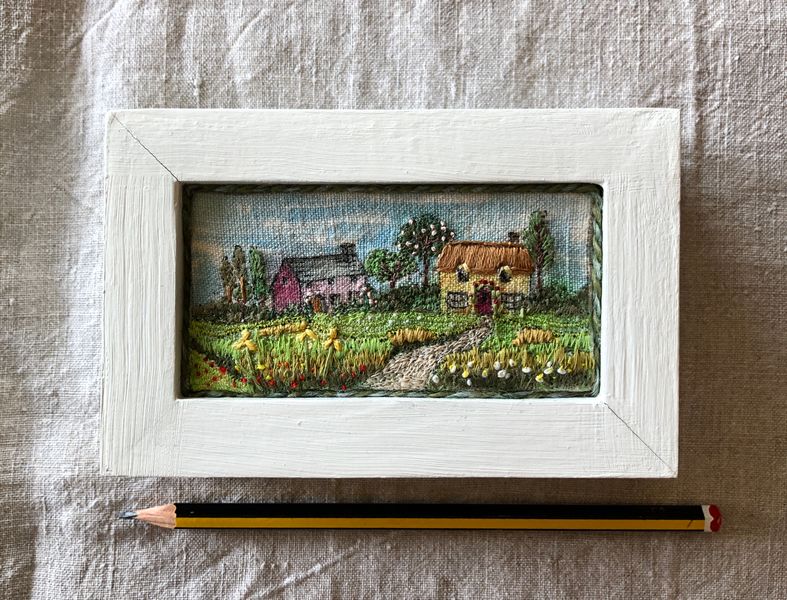 Free machine stitched landscape using water colours