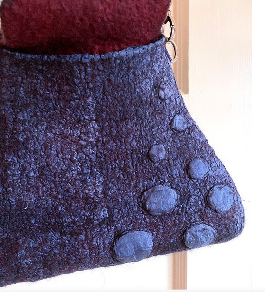 Nuno Resist detailing on Felted bag. Contrast colour interior.