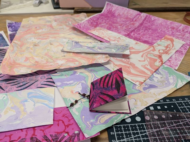 Making small sketch/note books using hand made paper using gel plate printing & marbling