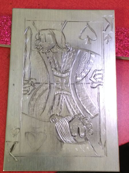A half finished engraved plate