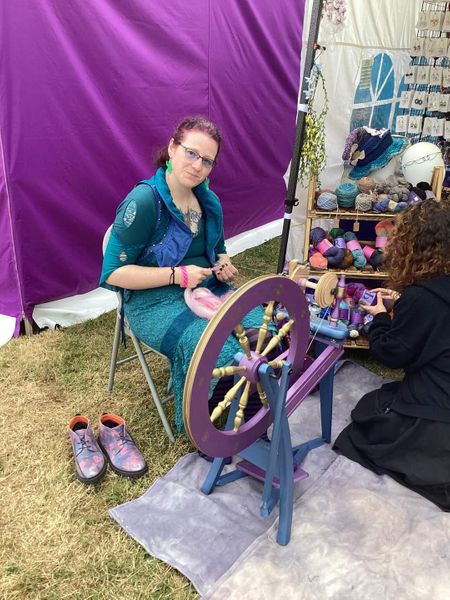 Tutor spinning at an outdoor event