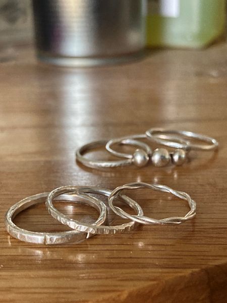 Examples of stacking rings made, with textures, twisted wire and granulation embellishments