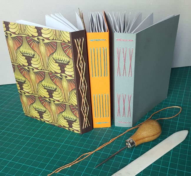 Lon cross stitch book binding