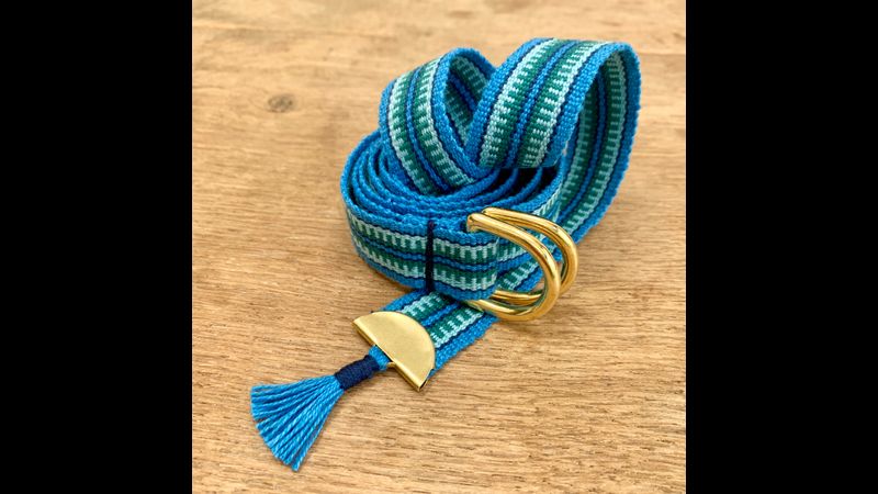 Hand woven belt with tassel in 'Ocean'.