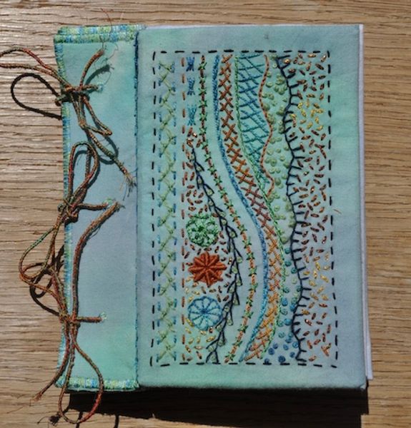 Hand embroidered journal cover