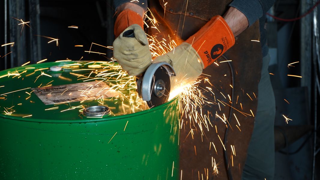 cutting an oildrum