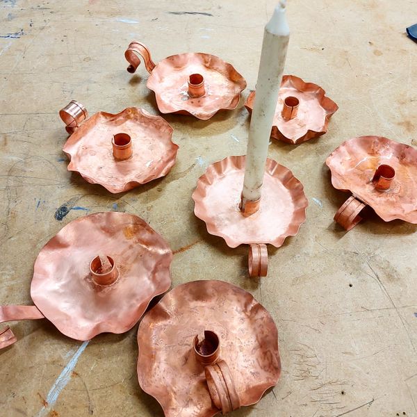 Group of copper candlesticks
