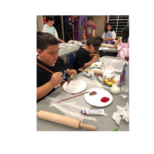 Kids painting magical wands!