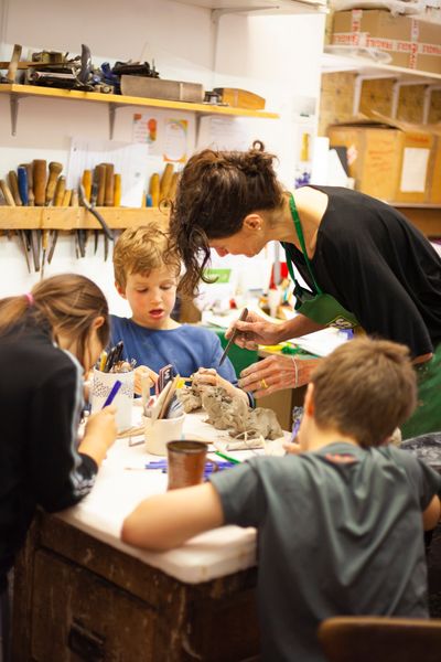 children making monsters in clay