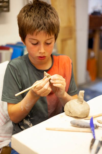 Child making in clay