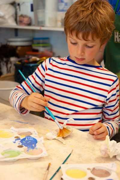 young boy glazing