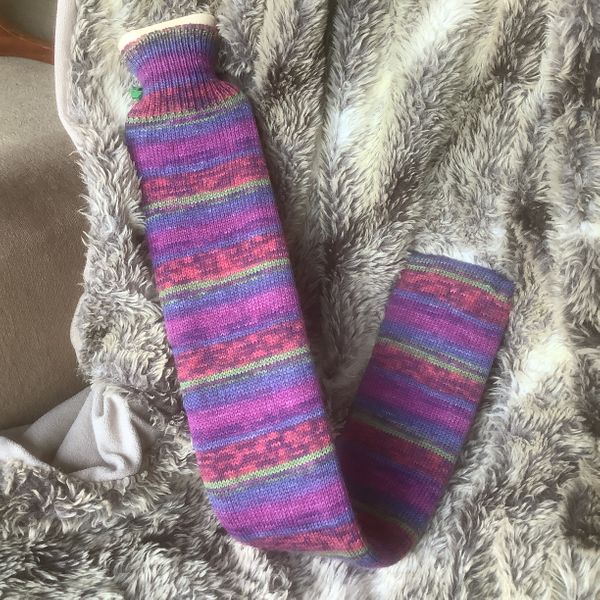 Extra long hot water bottle with handmade cover ( yarn design George )