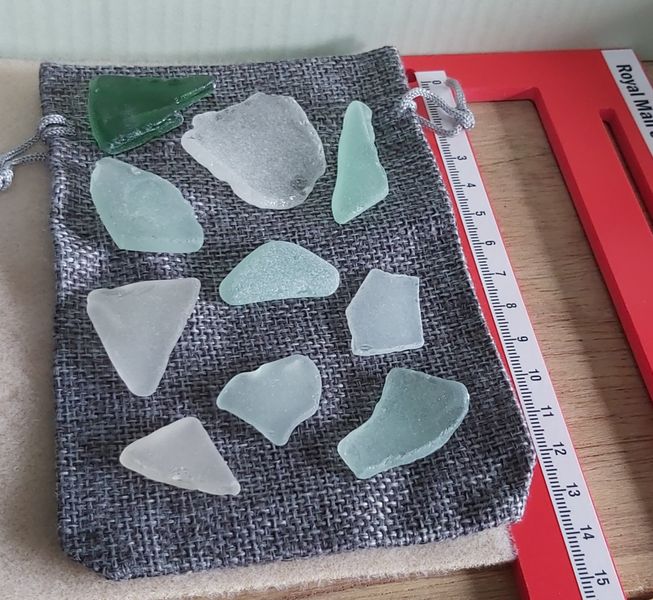 ECO SEA GLASS PIECES VARIOUS WITH THE RULER IN THE PHOTO SO YOU CAN SEE A GUIDE TO THE SIZEOF THE SEA GLASS YOU ARE CHOOSING