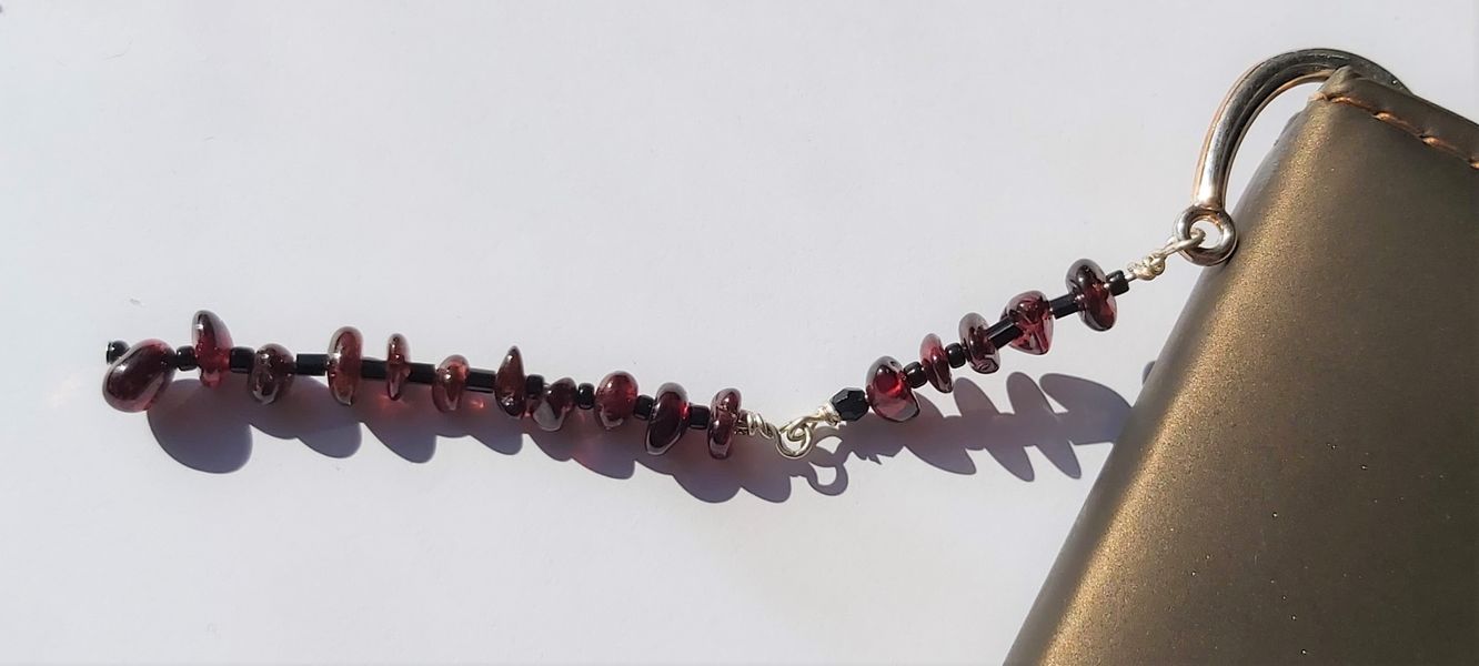 Garnet Decorates the Silver Bookmark 12cms in length