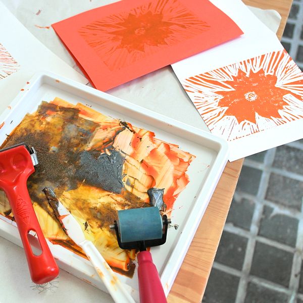 mixing orange and copper ink to produce a marigold print