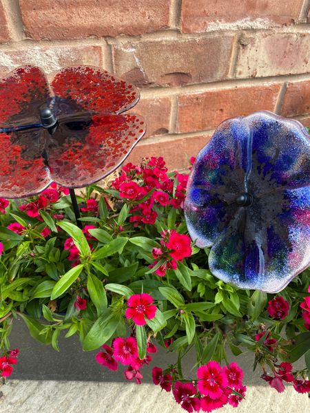 Make two flowers -a huge range of coloured frit (crushed glass) to work with
