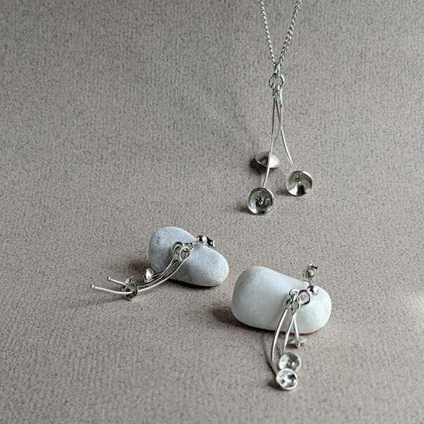 Silver blossom earrings and pendant example