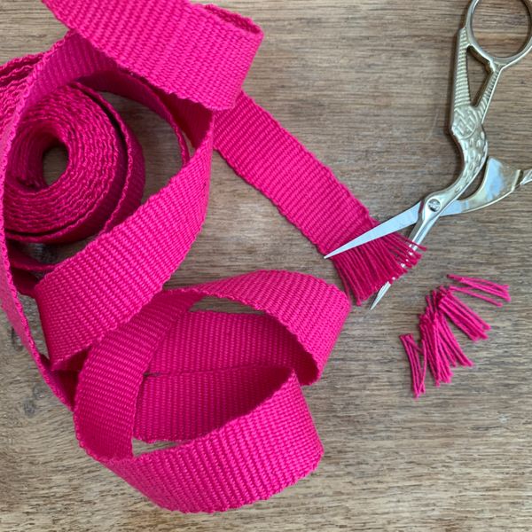 Bright pink band, handwoven on an Ashford inkle loom