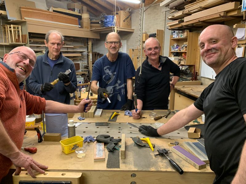 After an hour or two of work, students create razor sharp edges on their renovated chisels. 