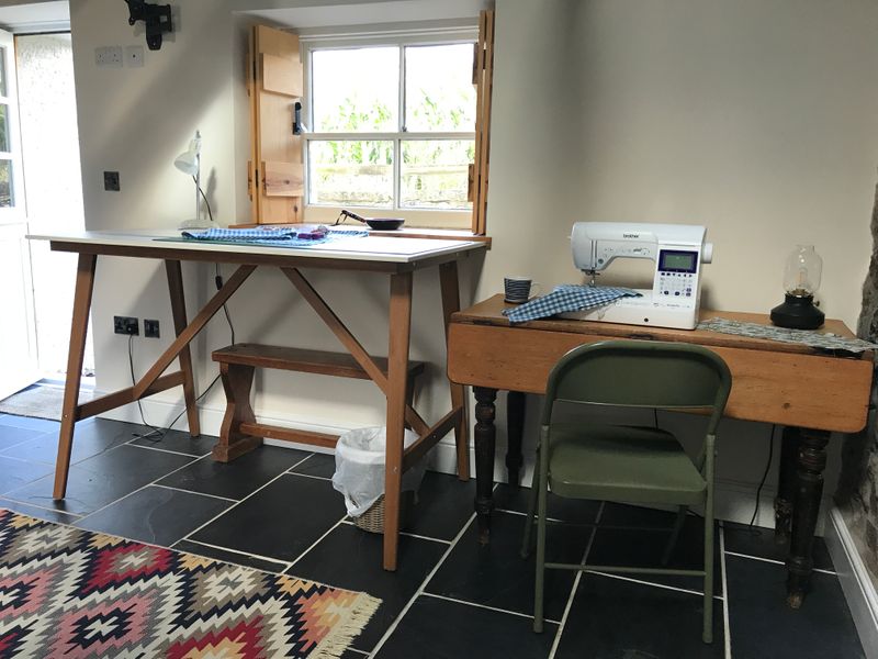 The studio has a working space for every student and a cutting table is provided