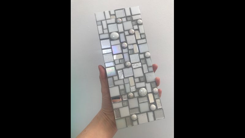 Silver and white interior wall plaque