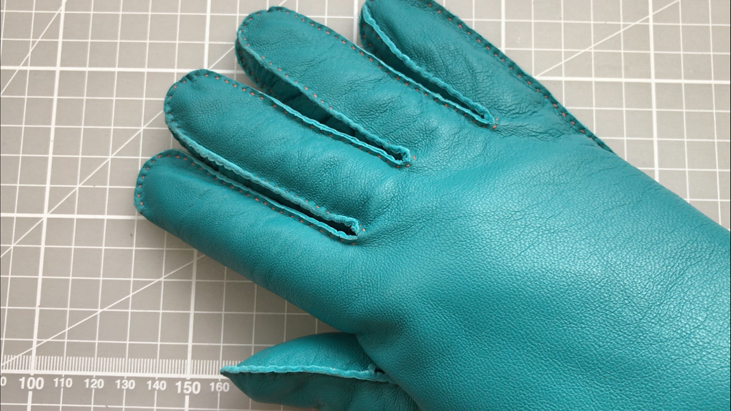 An example of a hand stitched glove.