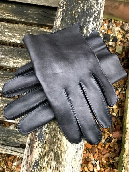 An example of hand stitched leather gloves.
