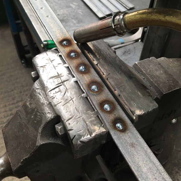 Welding onto bars that will make a 'Sea Urchin' candle holder