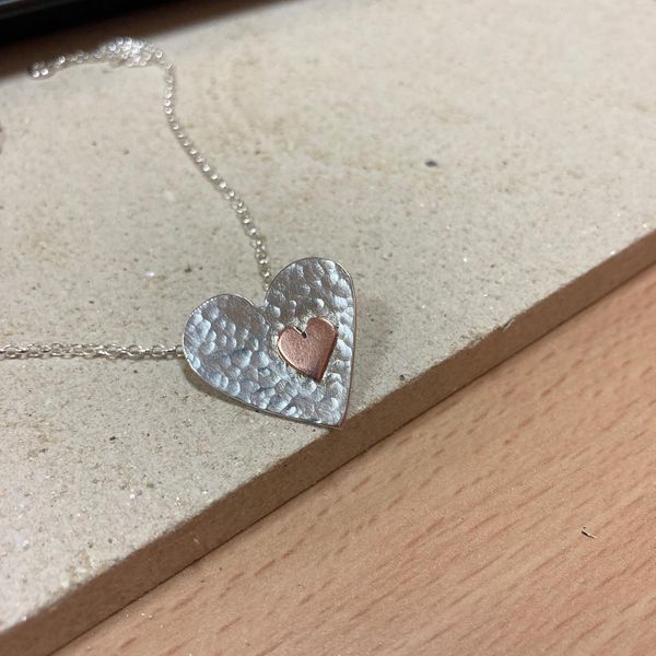 Heart necklace made by a student