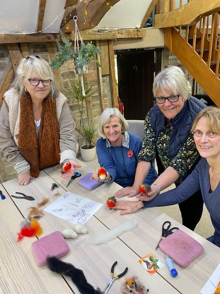 Happy needle felters with their Robin Redbreasts - Oast Studio workshop