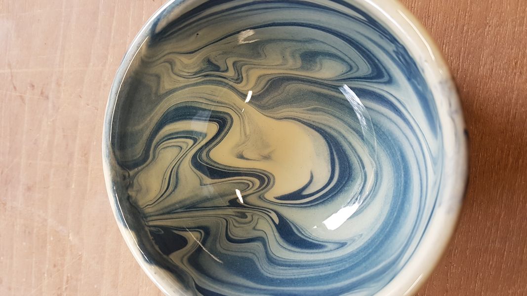 A bit of marbled slip decoration from a class.
