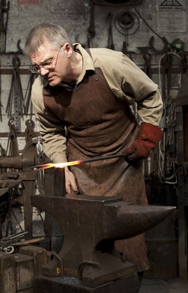 Aaron working at the forge